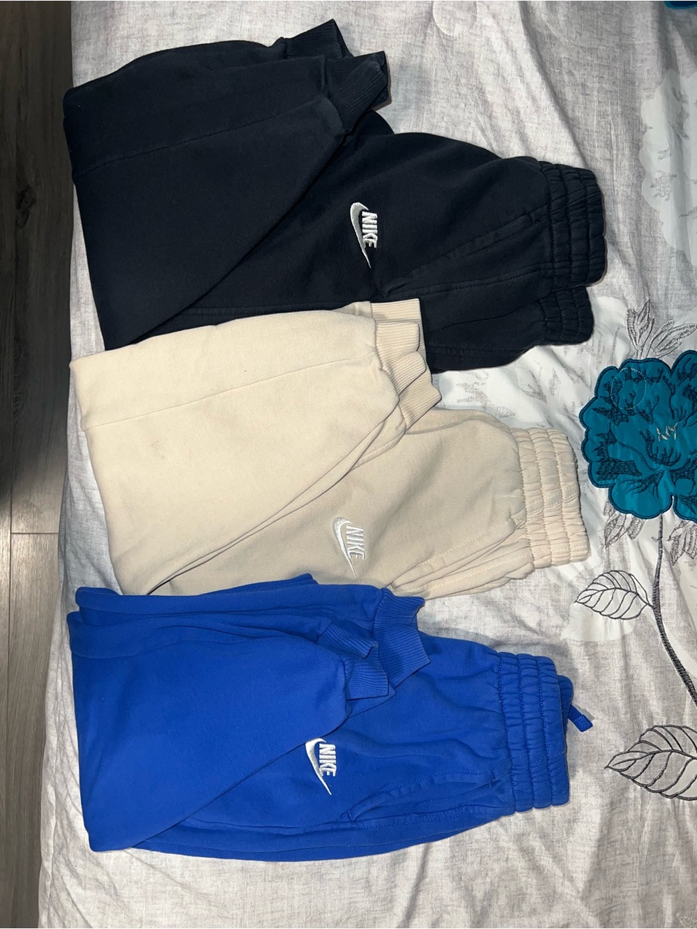 Nike Kids Sweatpants Trio in Black, Cream, and Blue